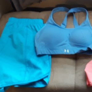 Two pairs of gym shorts and a sports bra